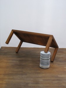 Mittag bei Ruthenbeck, 2007, wooden table, porcelain plates, 58 x 65 x 130 cm, Galerie Kunstagenten, Berlin